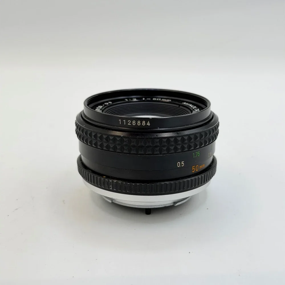 Minolta MC Rokkor-PF 50mm f/2 Lens with 55mm Skylight 1A Hood SR Mount 1126884